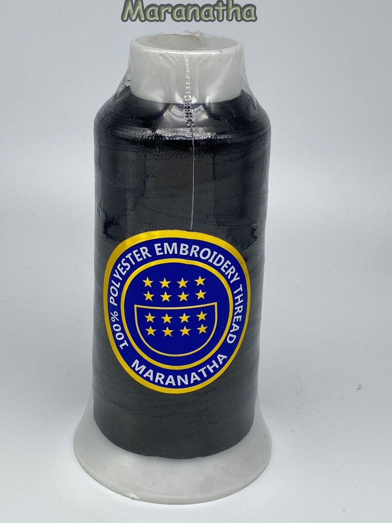 May include: A spool of black 100% polyester embroidery thread with a blue and yellow label that reads "100% Polyester Embroidery Thread Maranatha".