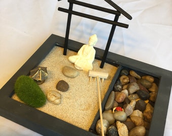 Mini zen garden with sand and pebbles