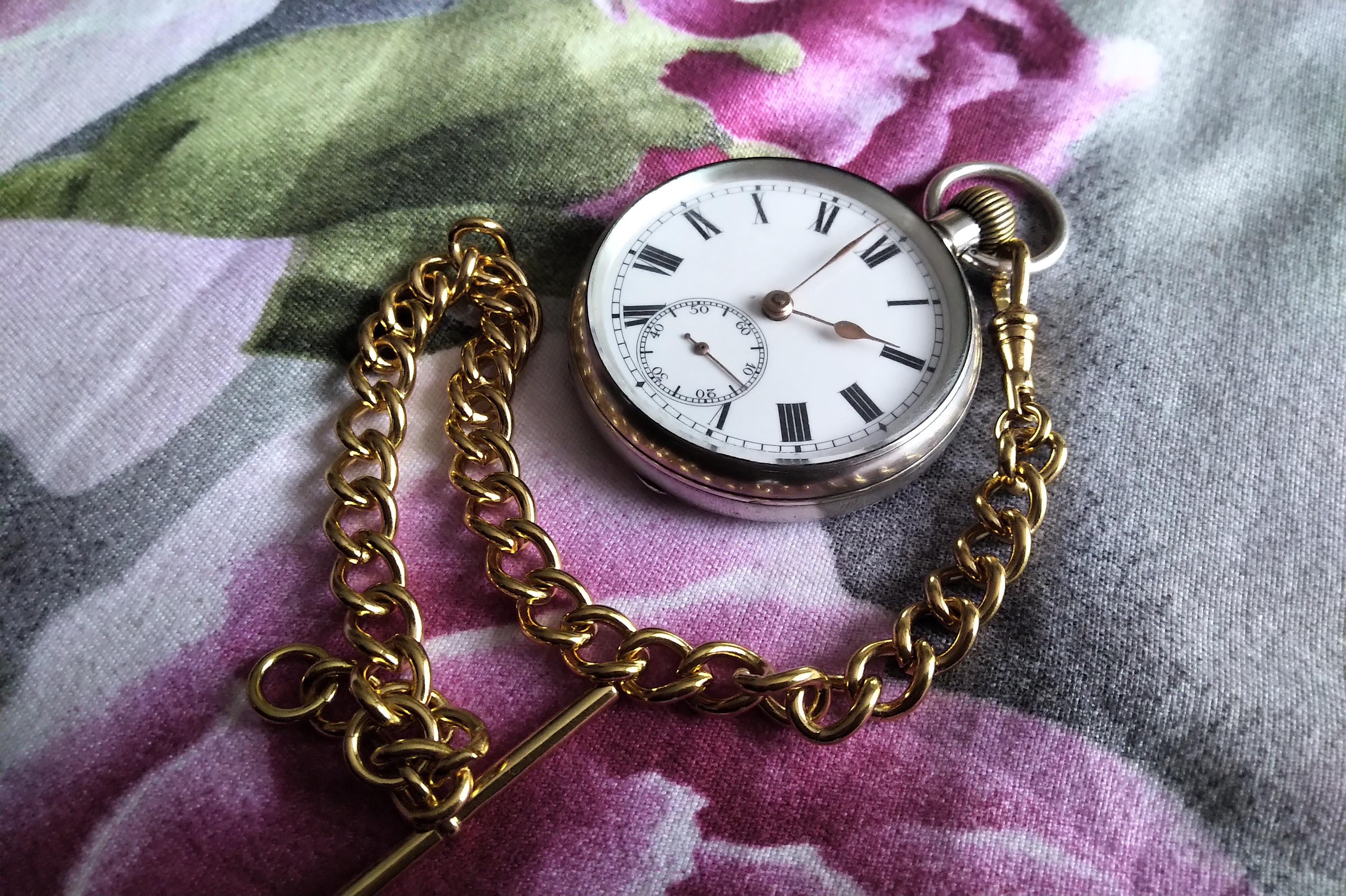 Hermoso reloj de bolsillo antiguo de plata con patente de MOERI
