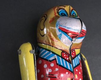 tin monkey toy