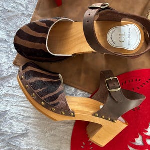 Black and Brown Cowhide High Heel Clogs: Crazy Horse Leather Ankle Strap, Wooden Sole