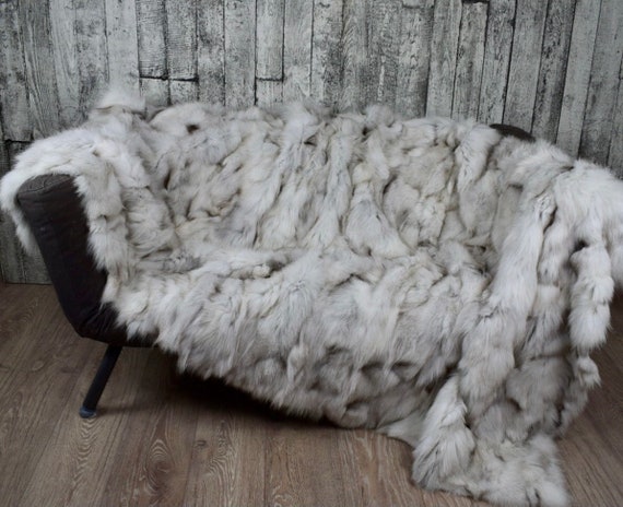 Elegant fluffy fur blanket, real fur throw, cozy fur blanket