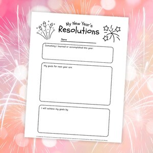 May include: A white paper with the text "My New Year's Resolutions" and space to write goals. The top of the paper has fireworks illustrations. The paper includes sections for past accomplishments, future goals, and how to achieve them.