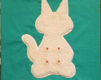 May include: A square teal throw pillow cover featuring a centered white plush cat silhouette appliqué. The cat shape has a textured, fuzzy surface with four small, evenly spaced orange embroidered dots arranged in a square pattern on its back.