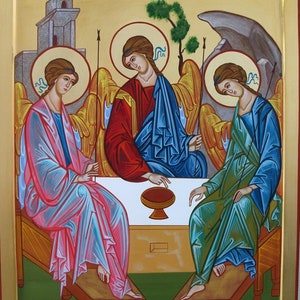 May include: A religious icon depicting the Holy Trinity, three figures with wings, sitting on a throne with a chalice in the center. The icon is painted in a traditional style with gold accents and the text "СТАА ТРИА" at the top.