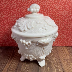 Jeannette milk glass candy dish in shell pink