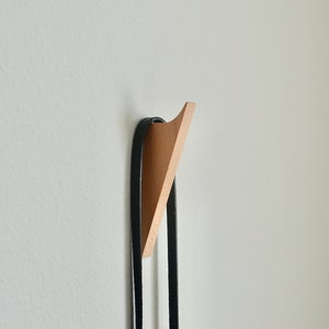 Single hooks for coats shop