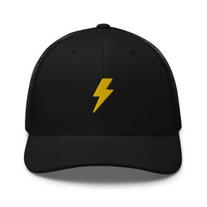 May include: Black mesh trucker hat with a yellow lightning bolt embroidered on the front.
