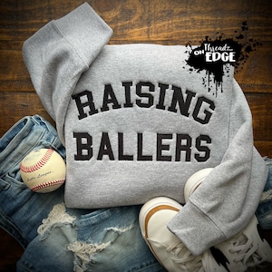 RAISING BALLERS