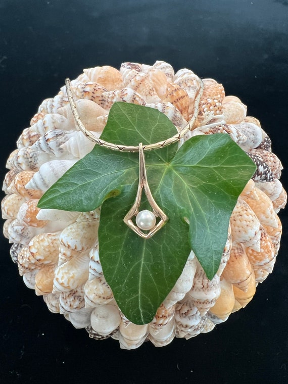 Vintage dainty cultured pearl pendant set in  14KT