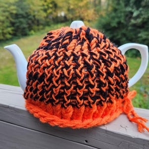 Tea Cozy - Knitted Orange and Black Handmade Variegated Yarn with Signature Button T-38