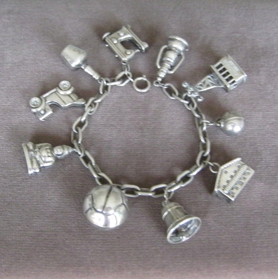 Vintage silver charm bracelet, 60s.