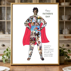 Puede incluir: Un regalo enmarcado para el Día del Padre con una silueta de superhéroe llena de fotos familiares. La obra de arte incluye una capa roja y el texto "Happy Father's Day". El marco es dorado y está sobre una mesa de madera.