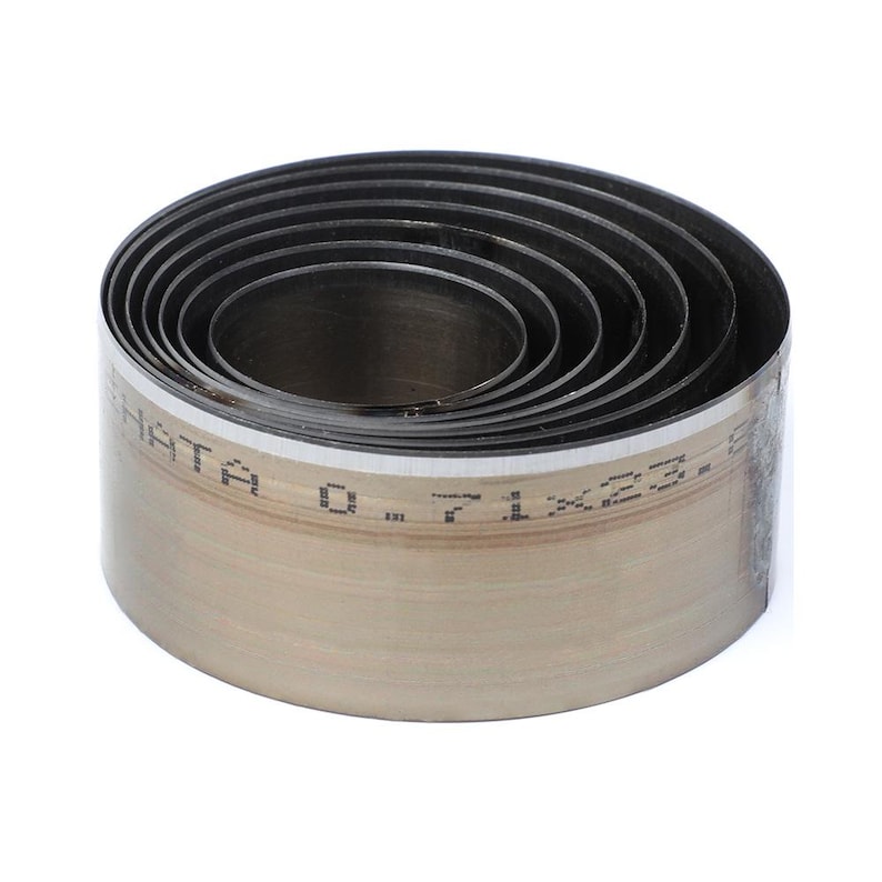 May include: A set of eight round metal hole punch tools, nested inside each other. The tools are silver with a black finish and have a label that reads "HATA 0.71 X 22.2 E".