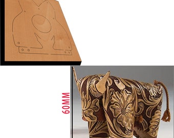 May include: A leather carving pattern for a bison, measuring 60mm by 50mm. The pattern is intricate and detailed, featuring floral designs and a horn on the bison's head.