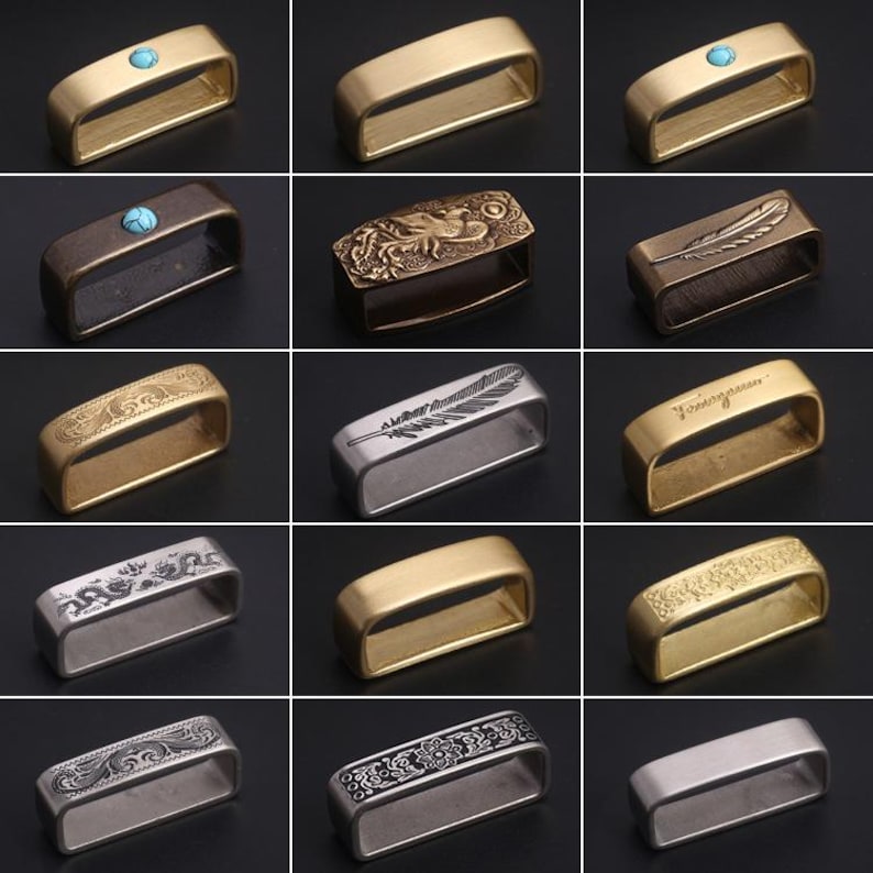 May include: A collection of 12 different belt buckle designs. The buckles are made of brass and feature various patterns and designs, including a feather, a floral pattern, and a geometric pattern. Some buckles have a turquoise stone inlay.