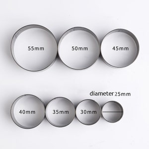 May include: Set of 7 round metal cookie cutters in various sizes: 55mm, 50mm, 45mm, 40mm, 35mm, 30mm, and 25mm diameter.