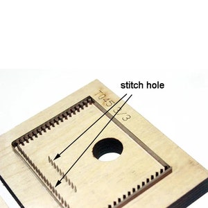 May include: A close-up of a wooden die-cutting template with a rectangular cutout and a round stitch hole. The template is labeled "T045 3/3".