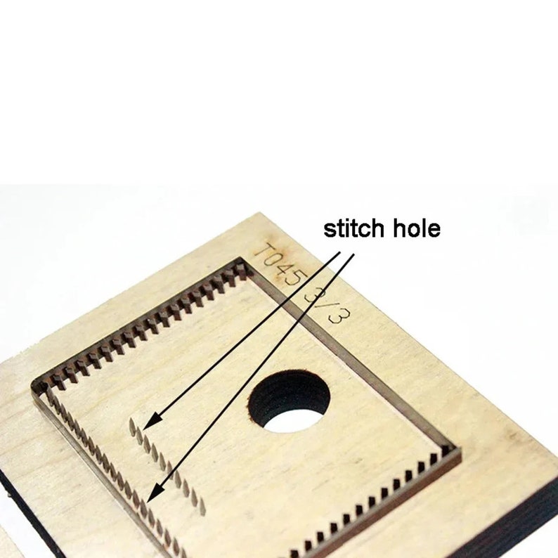 May include: A close-up of a wooden die-cutting template with a rectangular cutout and a round stitch hole. The template is labeled "T045 3/3".