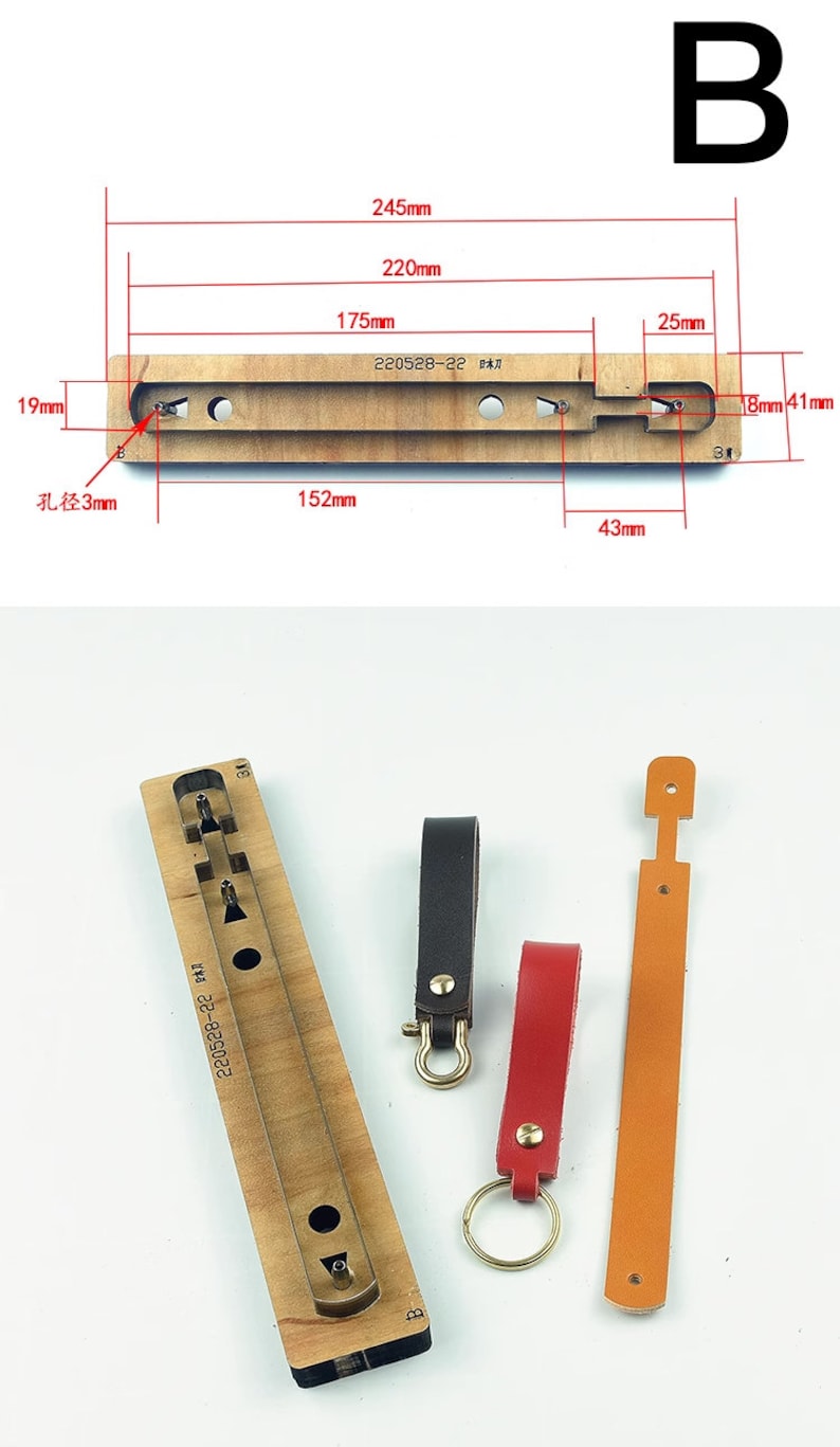 May include: A wooden leather craft tool with a metal punch for making keychains. The tool has a rectangular shape and is marked with the text "220528-22 日本刀".