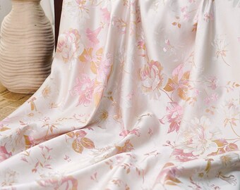 Brokadtyg, mjukt glansigt jacquardtyg med blommor, metervara