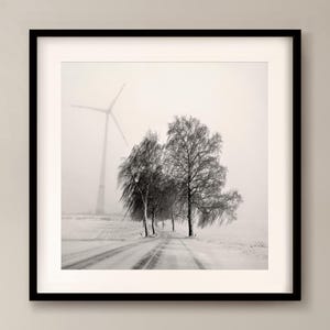 Winter landscape with road in fog | Black and white photography | Minimalist winter wall art | Winter road trip image 1