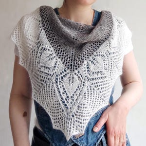 May include: A set of three ceramic mugs with a speckled, matte finish. The mugs are in shades of cream, light gray, and dark gray. Each mug has a simple, minimalist design and a rounded handle.