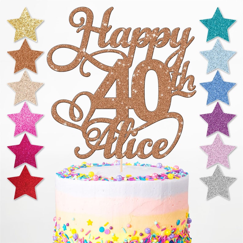 May include: A gold glitter cake topper with the text "Happy 40th Alice". The topper is on a cake with colourful sprinkles.