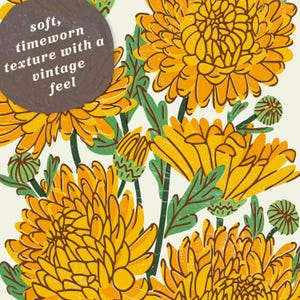 May include: A graphic illustration featuring vibrant yellow and orange chrysanthemum flowers with green stems and leaves on a cream background. A dark gray circular badge contains the white text: soft, timeworn texture with a vintage feel.