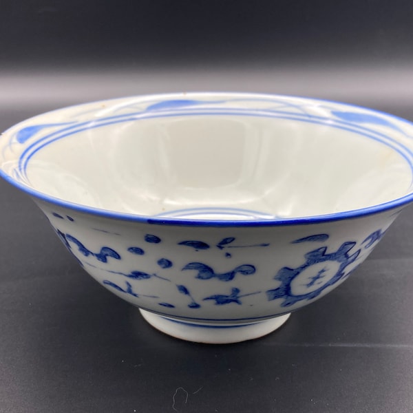 Vintage Chinese porcelain blue and white bowl.  7 inches wide.