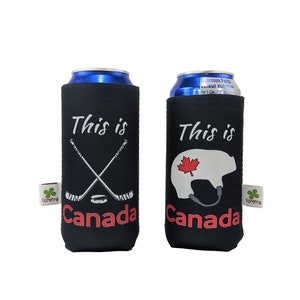May include: Two black neoprene can coolers with the text "This is Canada" printed on them. One cooler features a hockey stick and puck, while the other features a hockey helmet with a Canadian flag.
