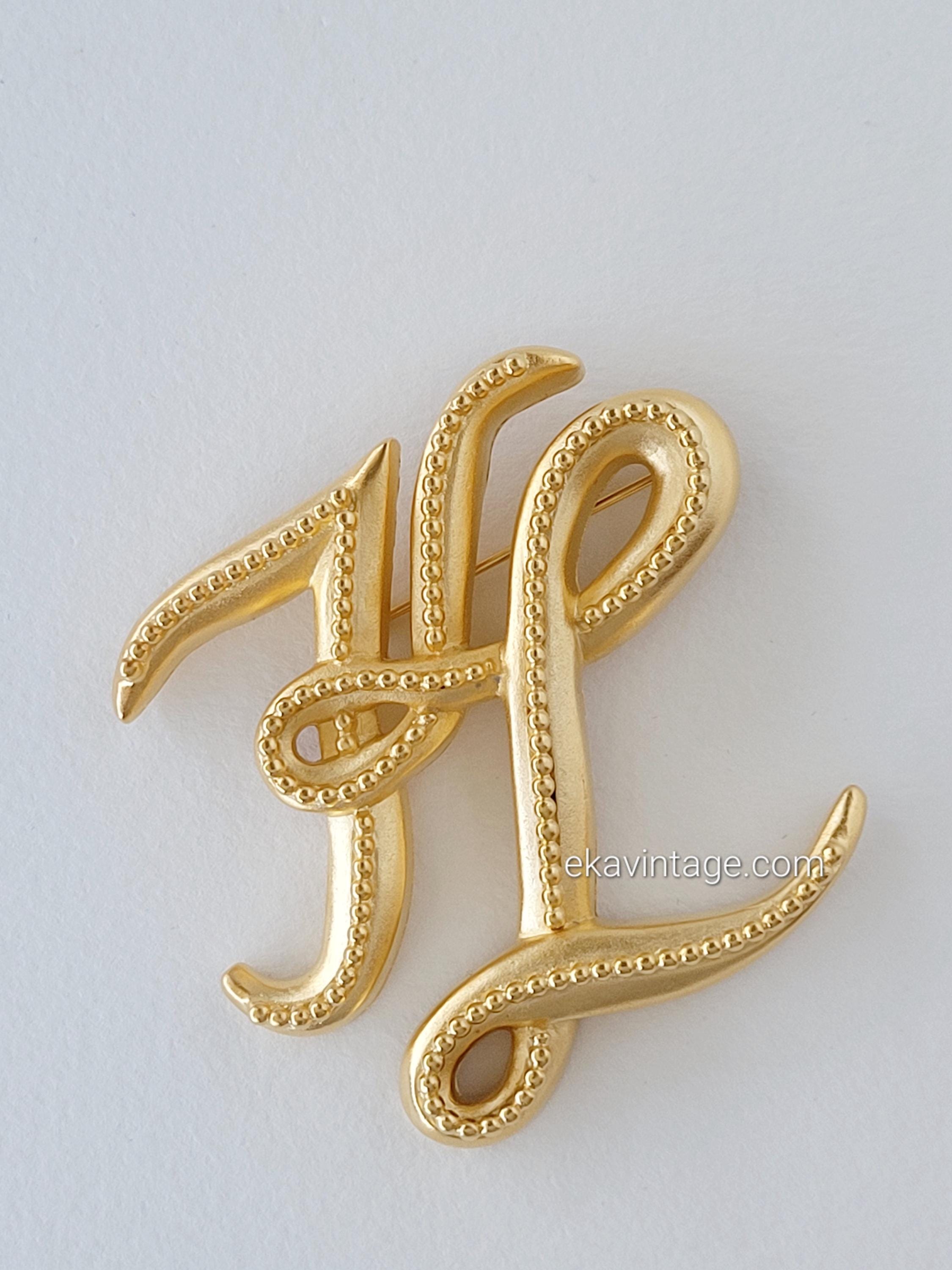 カール・ラガーフェルド - ヴィンテージの大きなKLブローチ - Etsy 日本