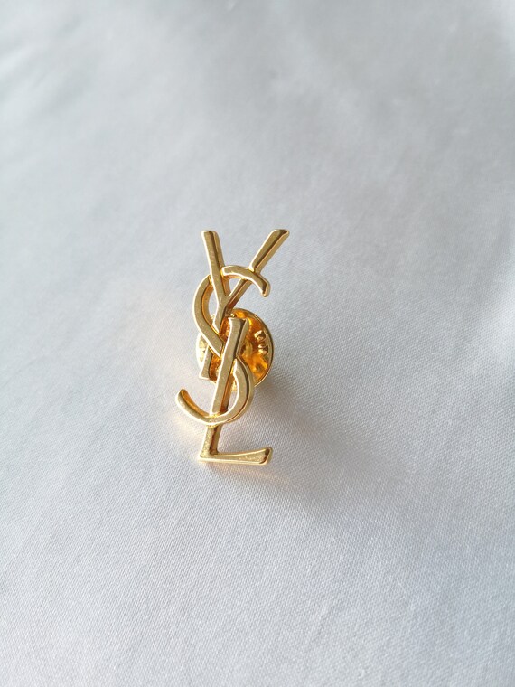 Pin's vintage Yves Saint Laurent