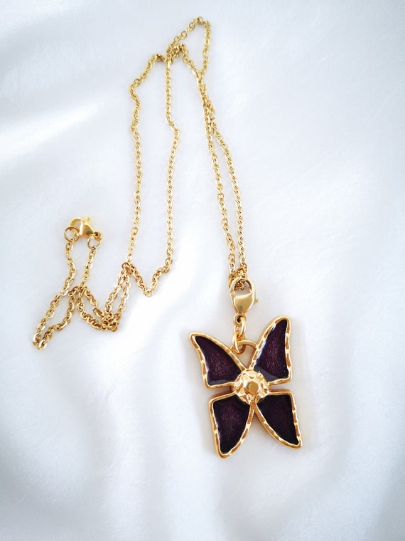 Pendentif / breloque vintage Yves Saint Laurent
