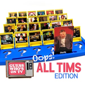 May include: A blue Guess Who? board game with yellow card holders and character cards. The game is titled "ALL TIMS EDITION" with the text "GUESS WHO'S ON TV" on a retro television graphic. The selected card shows "Charlie".