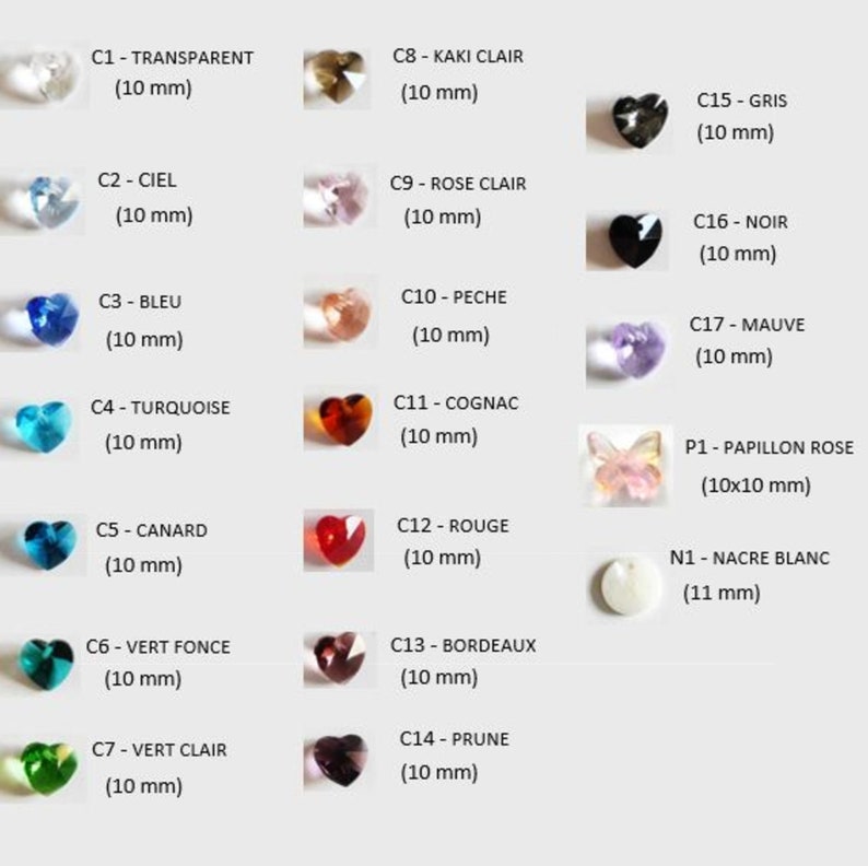 May include: Assortment of heart-shaped glass beads in various colors, including red, blue, green, purple, and brown. The beads are 10 mm in diameter. There are also a few other beads, including a butterfly-shaped bead and a round, white bead.