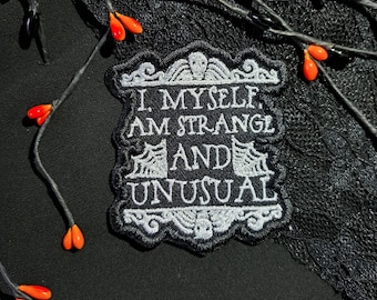 Strange and Unusual Gothic Patch | Spooky Iron-On Badge with Skulls | Horror Goth Embroidered Patch | Emo Alternative Fashion Vegan Patch