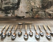 spoons 39 39 oneida china 18-10 39 39 in quality stainless steel. 5 soup spoons and 7 dessert spoons