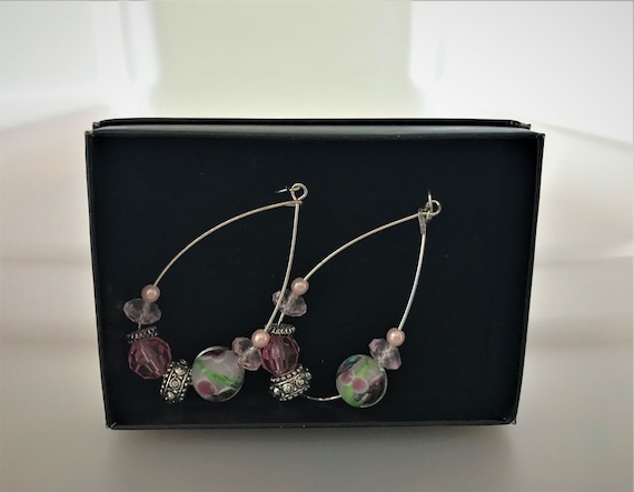 Avon teardrop-shaped earring with glass pearl and