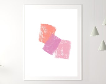 Peut inclure: Une impression d'art abstrait encadrée avec trois carrés superposés dans des tons de rose et d'orange. L'impression est accrochée à un mur blanc au-dessus d'un canapé de couleur claire avec deux coussins de couleur verte.