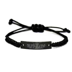 May include: Black braided bracelet with a black metal tag that reads "(1...NAME) NEVER FORGET THAT I LOVE YOU I HOPE YOU BELIEVE IN YOURSELF AS MUCH AS I BELIEVE IN YOU LOVE (2... MOM, DAD, ETC.)"