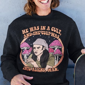 He was in a cult and cult was into aliens man sweatshirt, aliens sweatshirt, 70s hippie sweatshirt