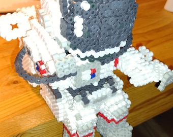 Portapenne seduto con astronauta 3D