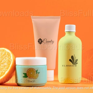 May include: An orange-themed product shot featuring a halved orange, a light blue jar with an orange graphic, a peach-colored tube with "Country Florals" text, and a yellow bottle with "Blossom" text. The background is orange.