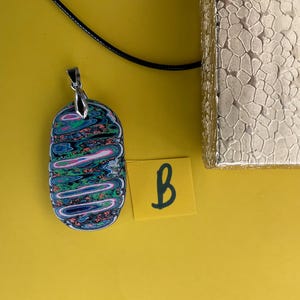 New Funkite  pendant necklace. Similar to Fordite