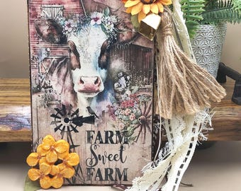 Handmade Farmhouse Cow Wall Hanging – “Farm Sweet Farm” Rustic Decor - Sunflower, Floral Ribbon accents - Country Kitchen Decor. Wood 10"
