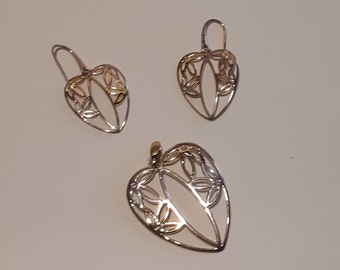 This is a unique Silver & Gold earrings and pendant ! Gold plated on sterling silver earrings and pendant set