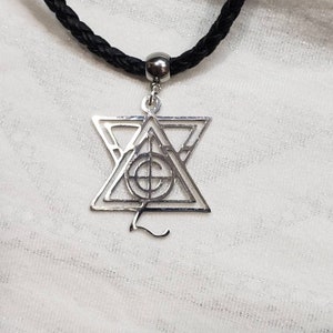 ghost symbol necklace