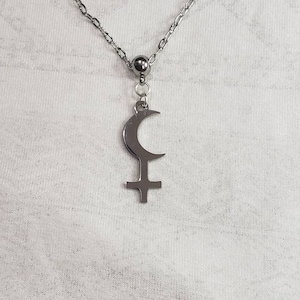 Black moon Lilith symbol necklace.