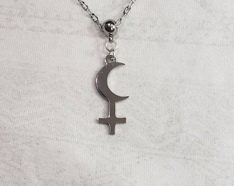 Black moon Lilith symbol necklace.